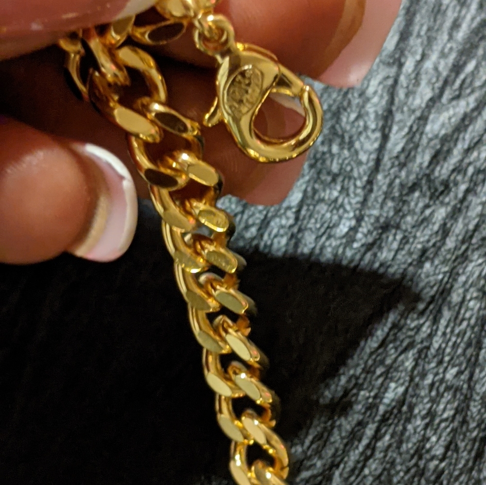 Chanel necklace.